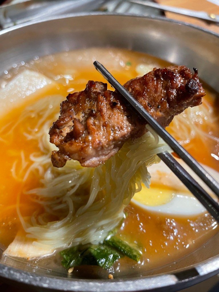 Mulnaengmyeon pairs perfectly with grilled meat