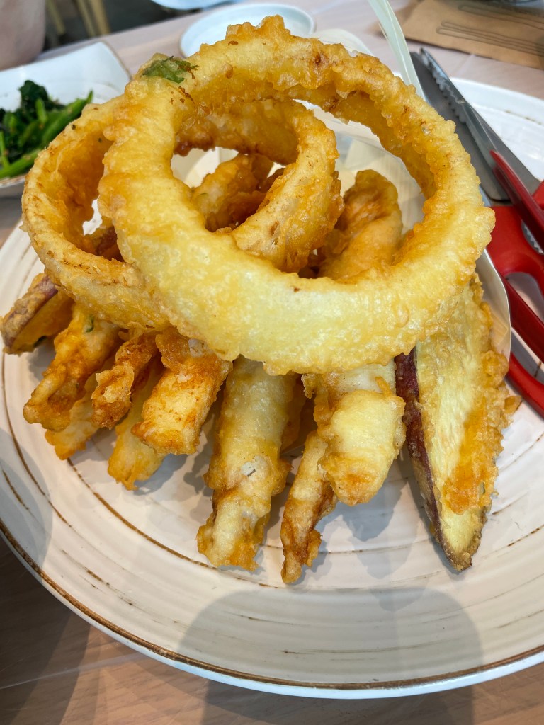 Fried puffer fish, onions, and sweet potato