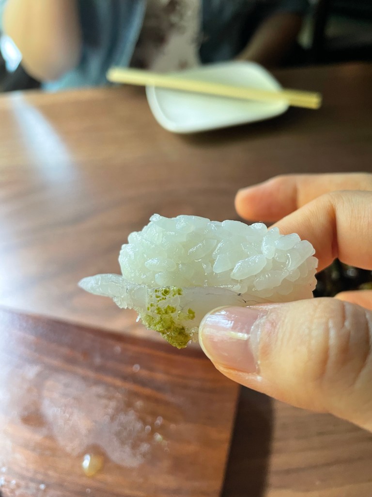 Gotta flip the sushi to enjoy all those flavors! 