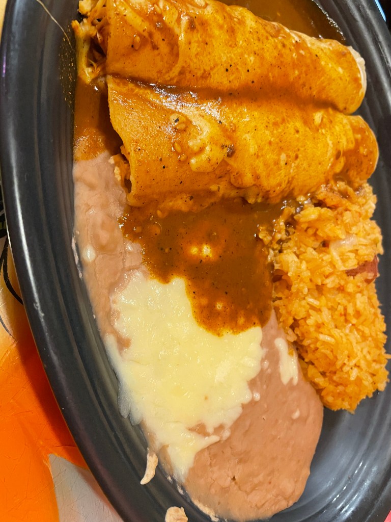 Enchilada with rice and beans