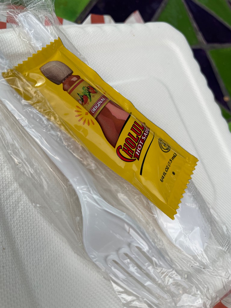 Hot sauce and utensils