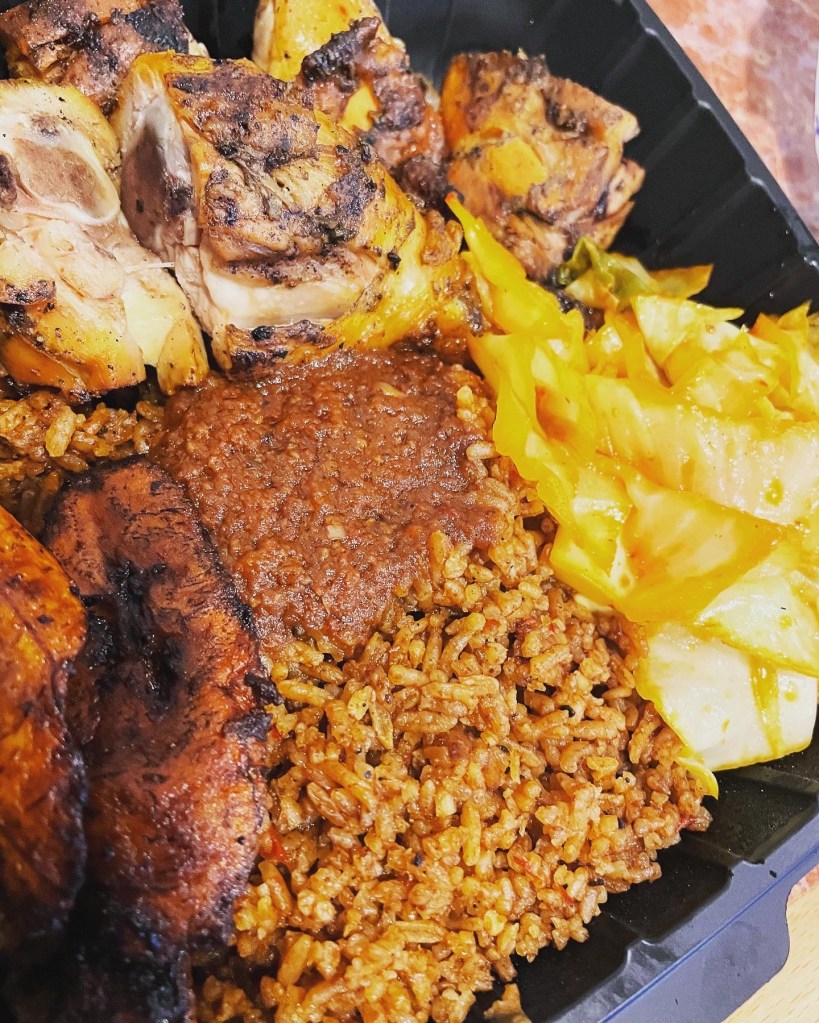 Grilled chicken with jollof, plantains, and cabbage
