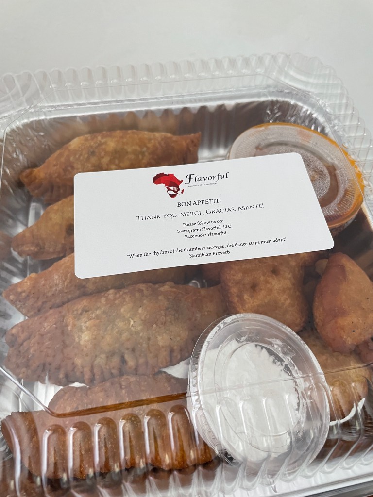 Prepared meal with fatayas and puff puff